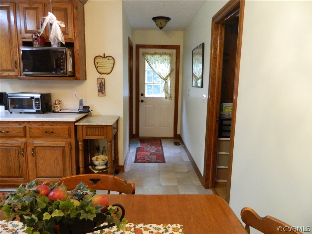 22929 King William Road West Point, VA 23181 - Photo 8 of 23 Kitchen- view of hallway off kitchen that leads