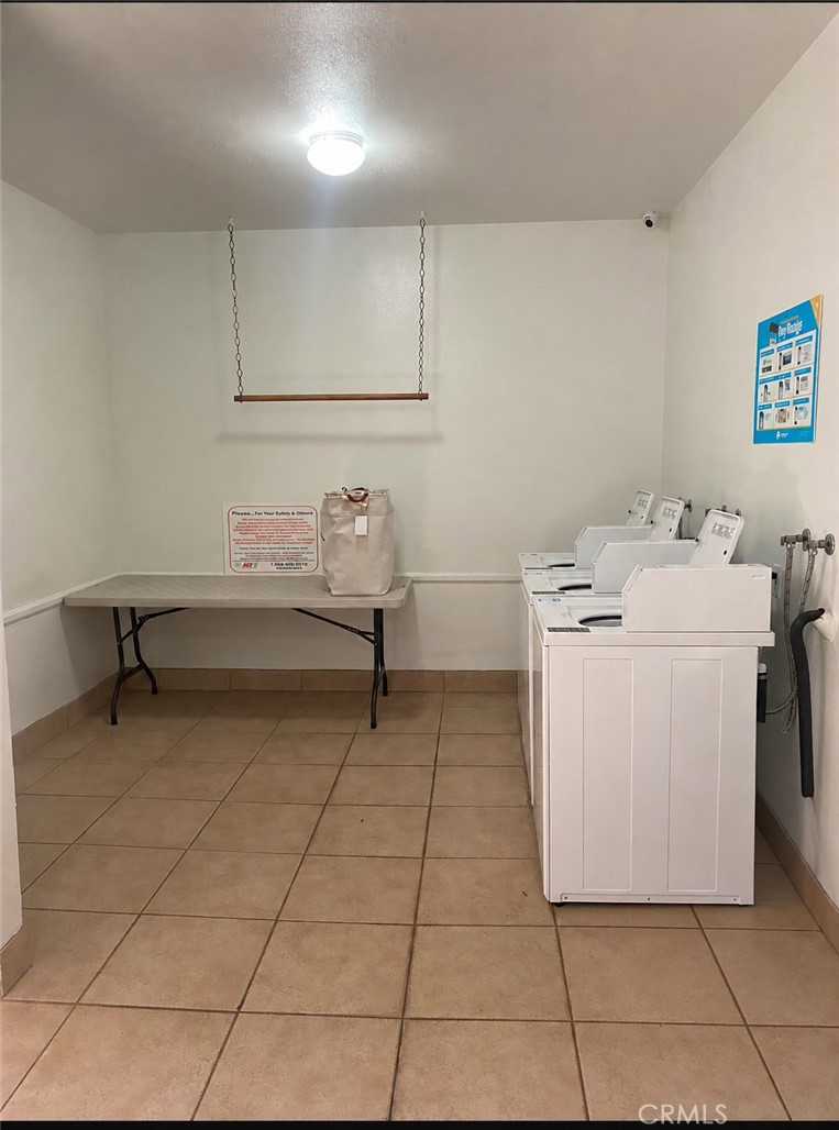 3032 Associated Road, Unit 79 Fullerton, CA 92835 - Photo 31 of 35 LAUNDRY ROOM