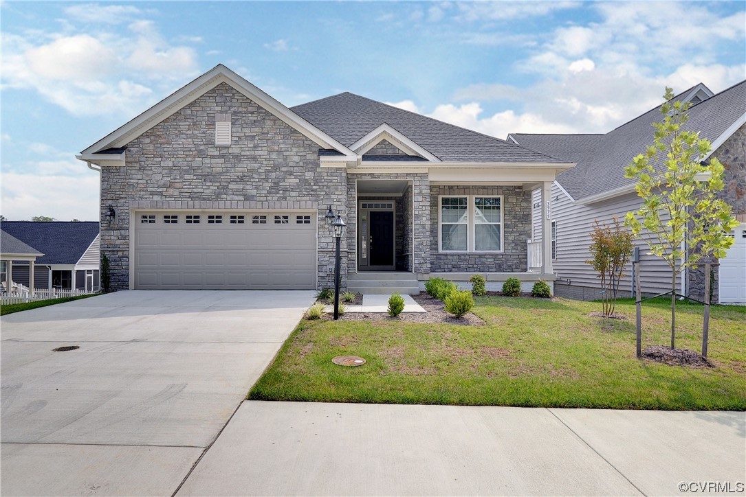 3975 Isaac Circle Williamsburg, VA 23188 - Photo 1 of 36 a front view of a house with a yard