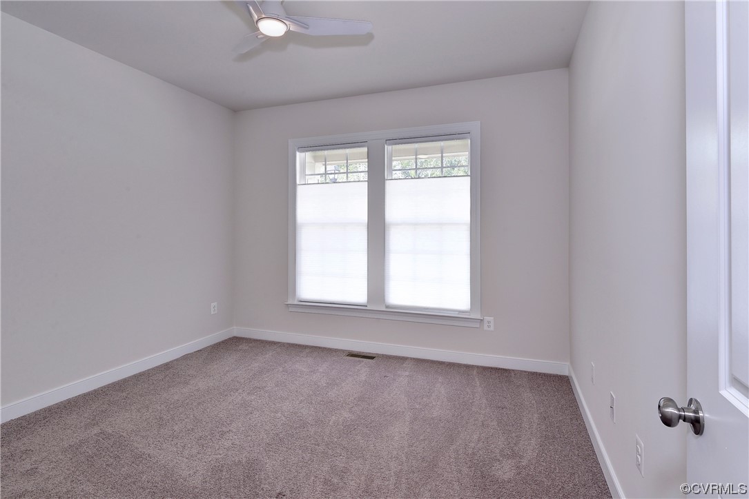 3975 Isaac Circle Williamsburg, VA 23188 - Photo 12 of 36 an empty room with a window