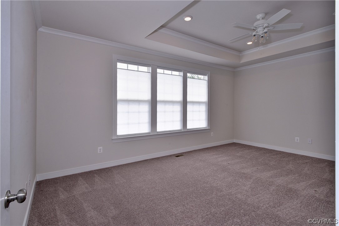 3975 Isaac Circle Williamsburg, VA 23188 - Photo 13 of 36 an empty room with windows and ceiling fan