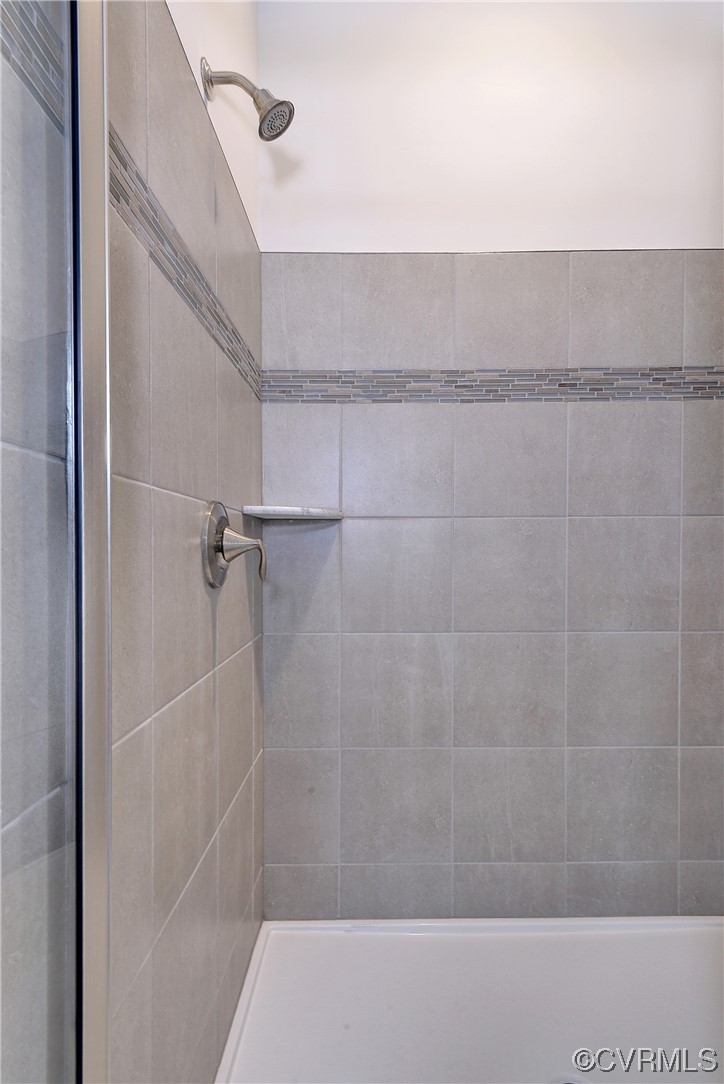 3975 Isaac Circle Williamsburg, VA 23188 - Photo 21 of 36 a bathroom with a shower