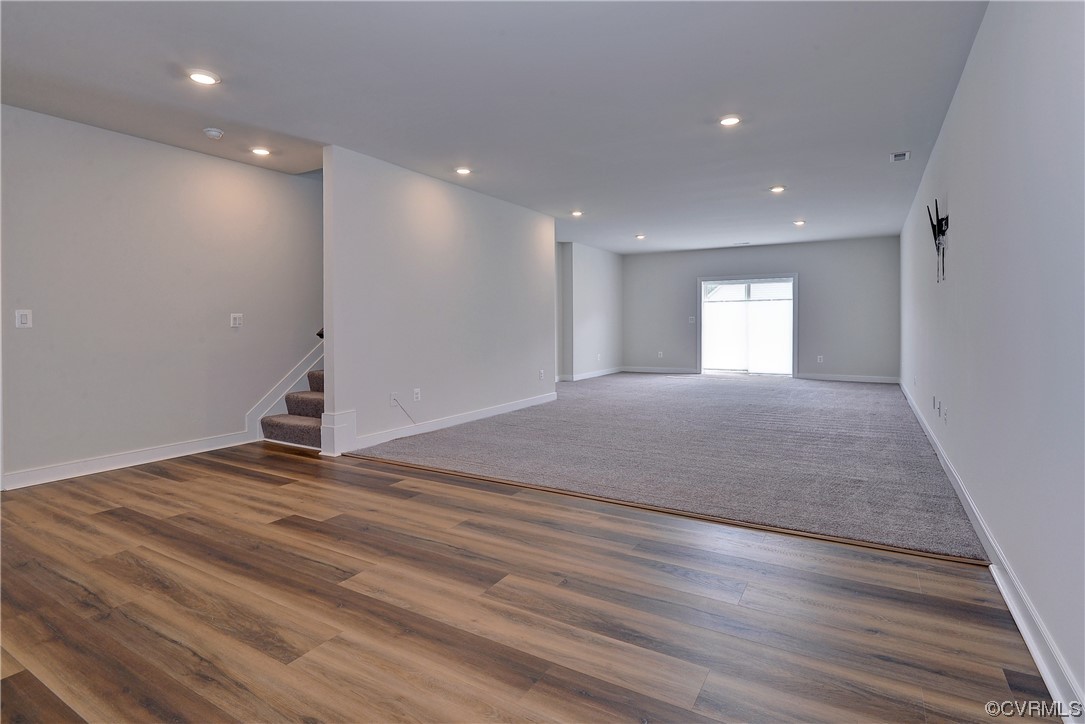 3975 Isaac Circle Williamsburg, VA 23188 - Photo 26 of 36 a view of an empty room with wooden floor and a window