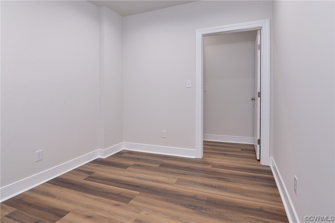 3975 Isaac Circle Williamsburg, VA 23188 - Photo 30 of 36 a view of an empty room with wooden floor