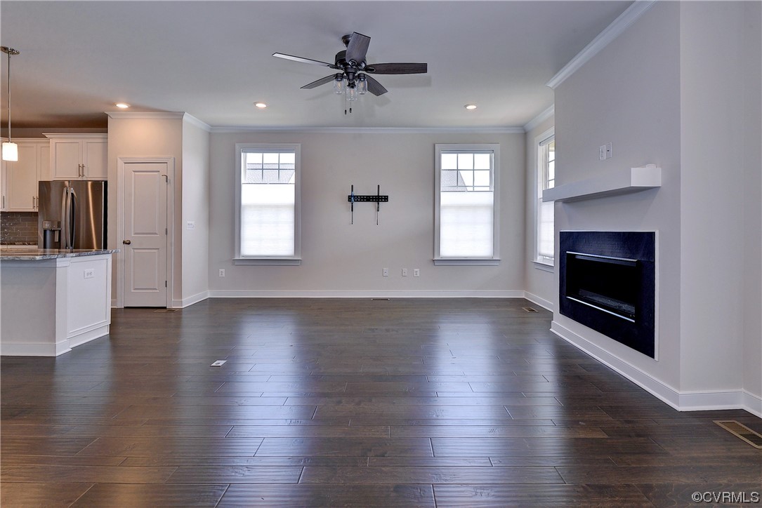 3975 Isaac Circle Williamsburg, VA 23188 - Photo 9 of 36 a view of a kitchen wooden floor and a fireplace