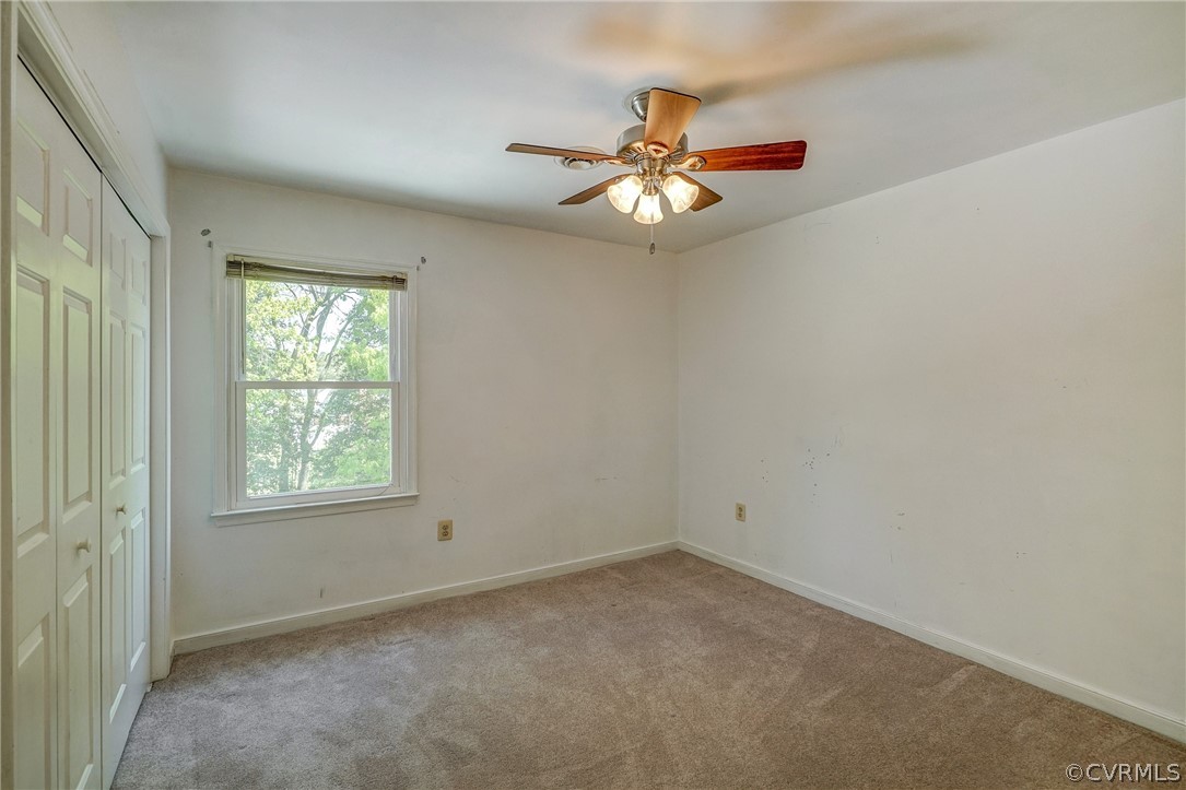 5212 Gatebridge Road Richmond, VA 23234 - Photo 30 of 47 an empty room with windows and fan