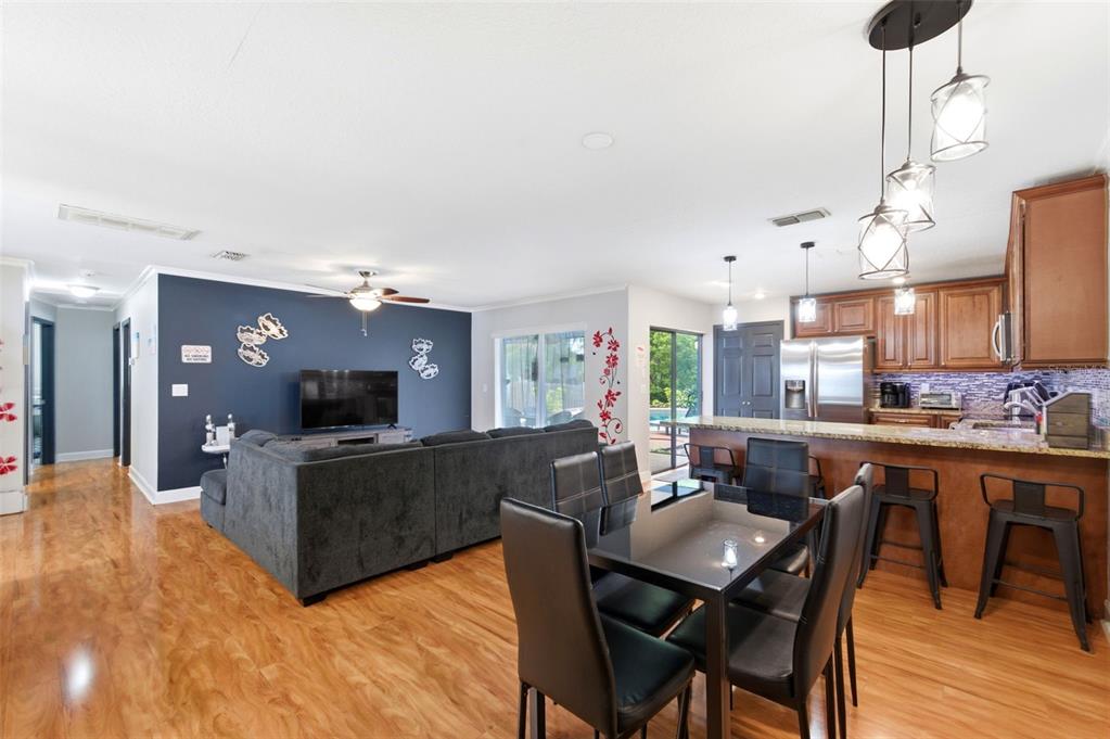 2816 Rustic Oaks Drive Palm Harbor, FL 34684 - Photo 18 of 70 a view of a dining room with furniture