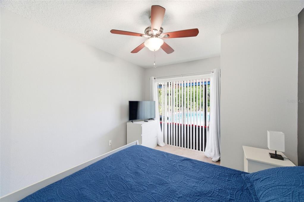 2816 Rustic Oaks Drive Palm Harbor, FL 34684 - Photo 32 of 70 a view of an empty room with wooden floor and a window