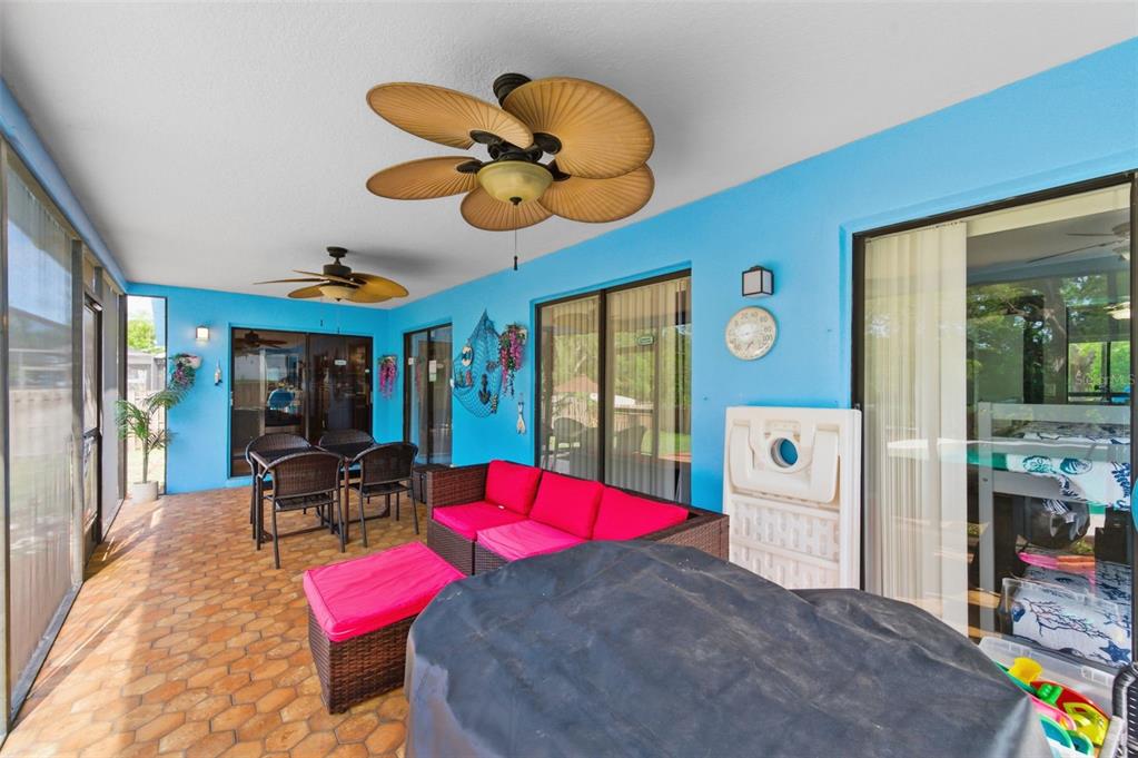 2816 Rustic Oaks Drive Palm Harbor, FL 34684 - Photo 44 of 70 a view of a room with furniture and chandelier