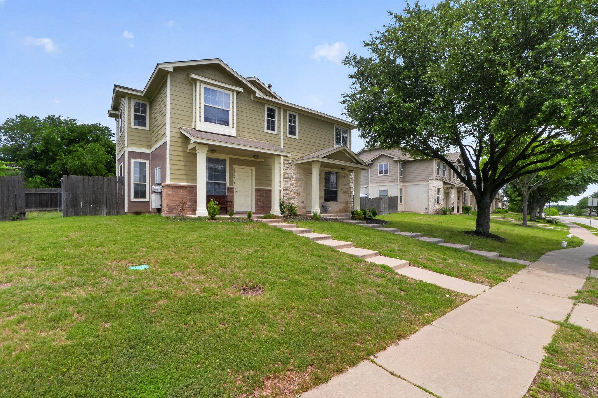 13808 Harris Ridge Boulevard Pflugerville, TX 78660 - Photo 9 of 40 a front view of house with yard and green space