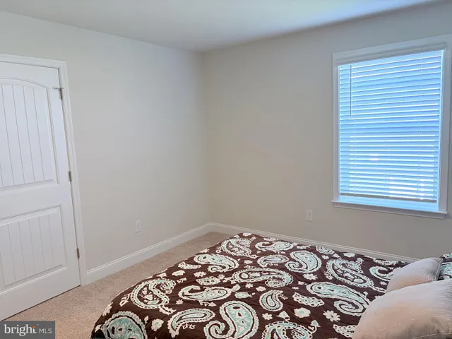 a bedroom with a bed