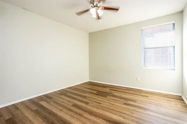 a view of a room with a large window