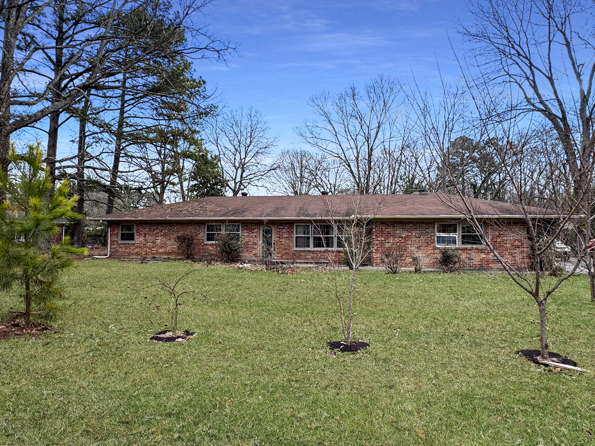 1308 Royal Trail Manchester, TN 37355 - Photo 1 of 18 a view of a house with a backyard