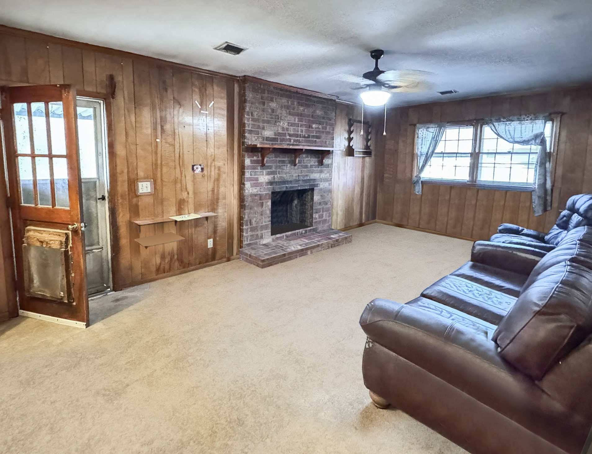1308 Royal Trail Manchester, TN 37355 - Photo 3 of 18 a living room with furniture and a fireplace