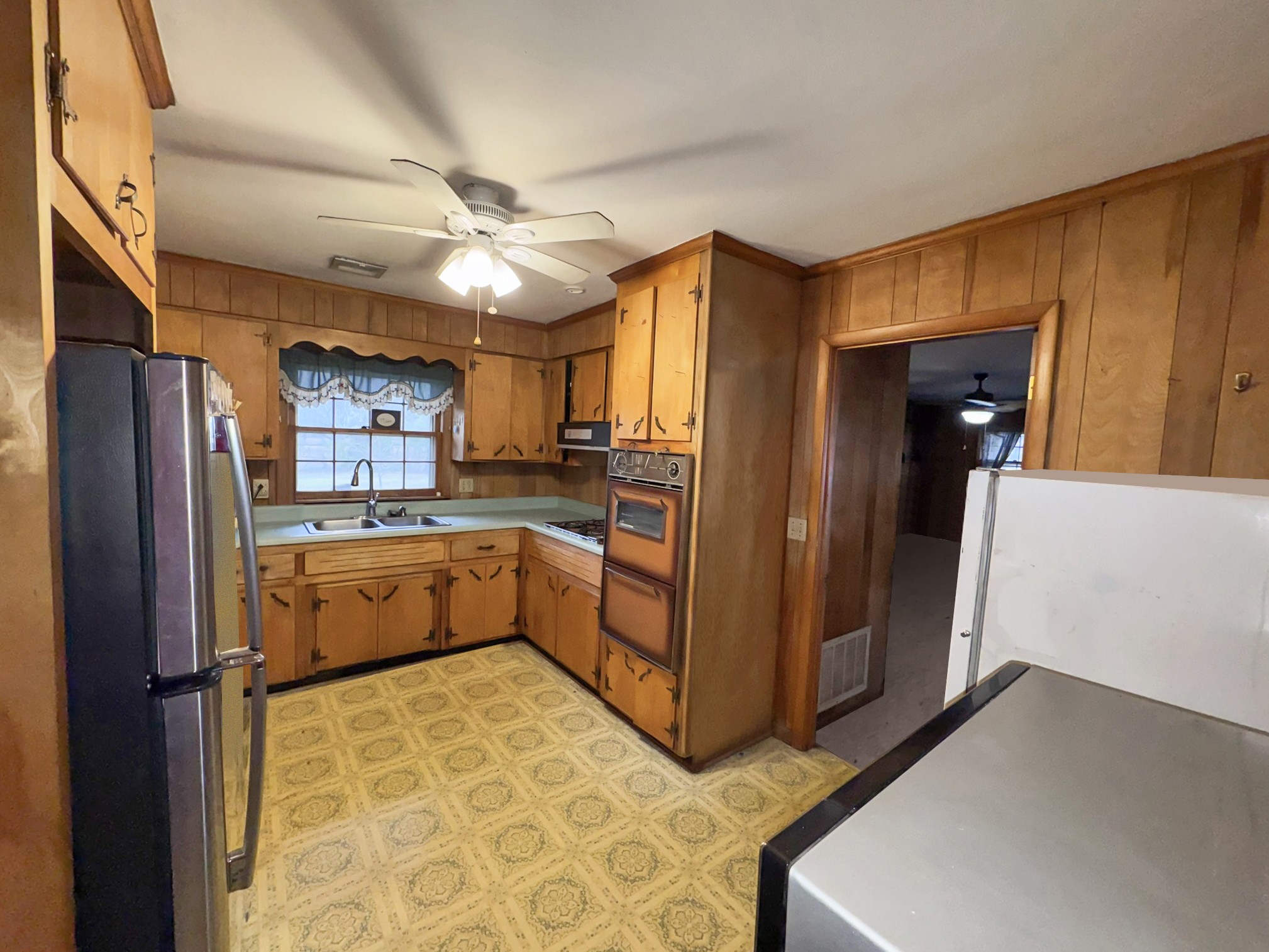1308 Royal Trail Manchester, TN 37355 - Photo 5 of 18 a kitchen with stainless steel appliances granite countertop a refrigerator and a stove top oven