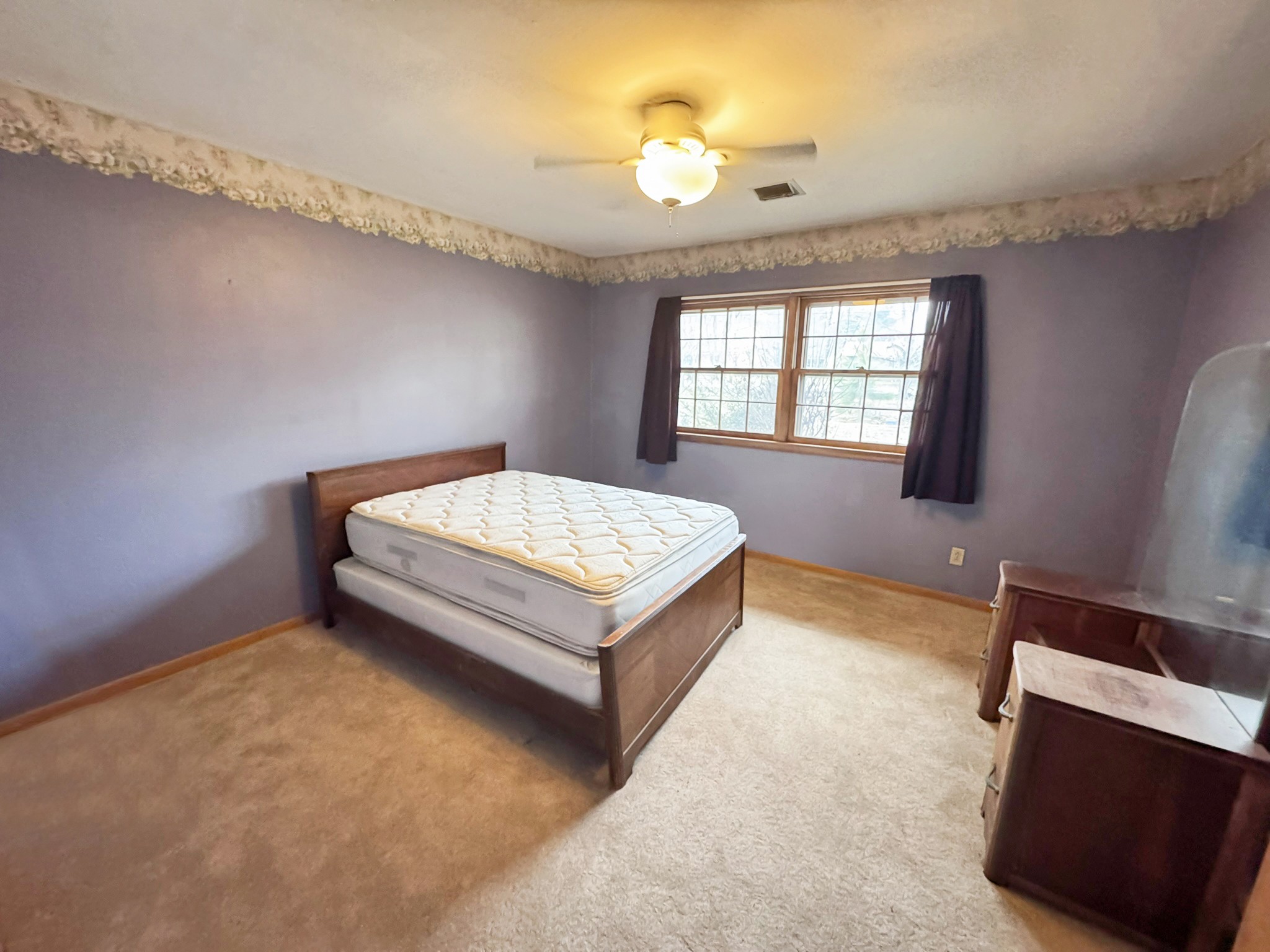 1308 Royal Trail Manchester, TN 37355 - Photo 9 of 18 a bedroom with a bed and window