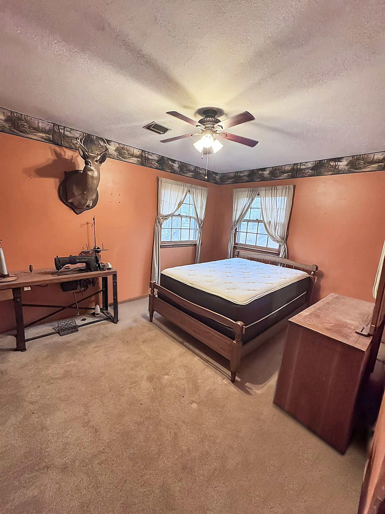 1308 Royal Trail Manchester, TN 37355 - Photo 10 of 18 a living room with furniture a ceiling fan and a wooden floor