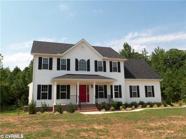 10 Earl Road Goochland, VA 23063 - Photo 3 of 17 a front view of a house with garden