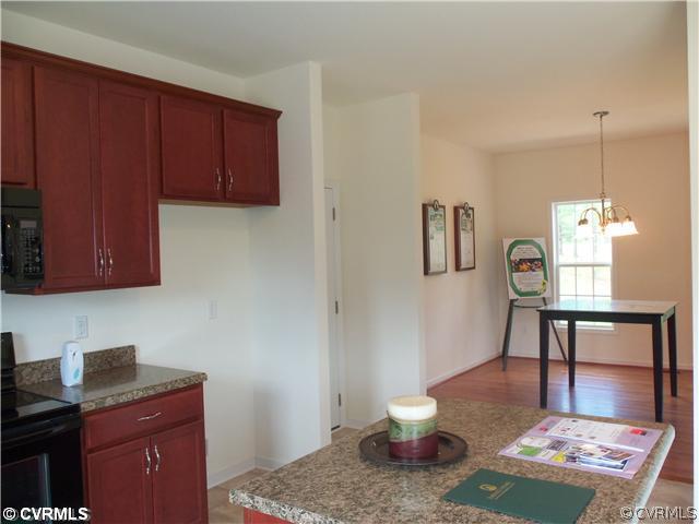 10 Earl Road Goochland, VA 23063 - Photo 9 of 17 a living room with furniture and wooden floor