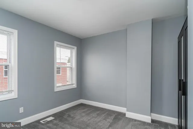 a view of a room that has a window in it