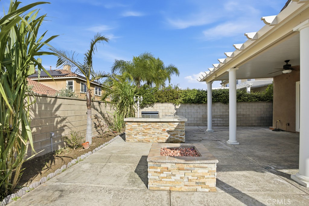 6865 Hop Clover Road Eastvale, CA 92880 - Photo 53 of 59 a view of a bench in patio