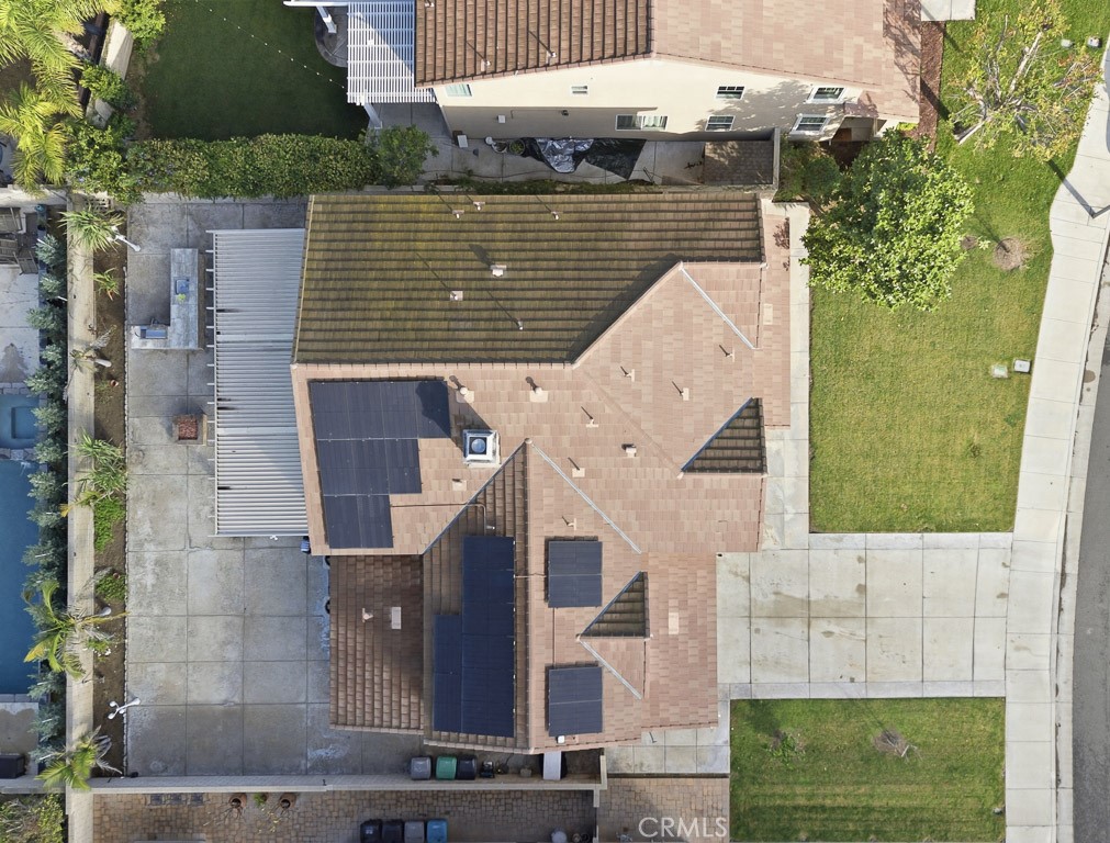 6865 Hop Clover Road Eastvale, CA 92880 - Photo 59 of 59 an aerial view of a house with a yard