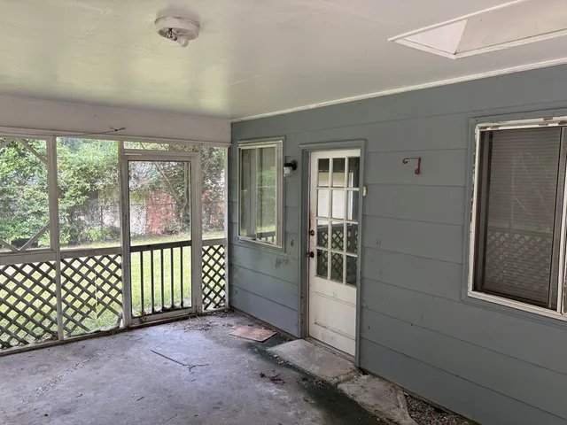 an empty room with windows