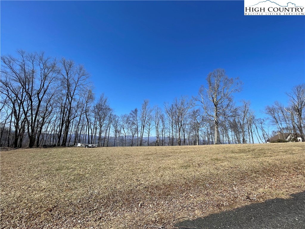 Tbd Lot #4 Tbd Ridge Lansing, NC 28643 - Photo 14 of 23 a view of backyard with a house