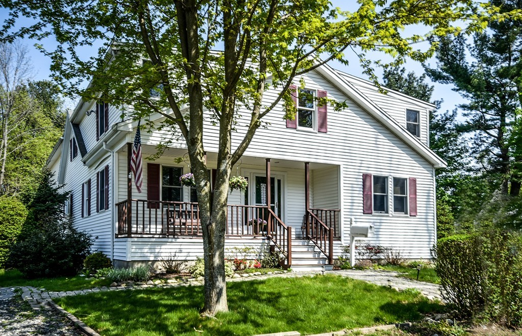 5 Lupine Road Natick, MA 01760 - Photo 1 of 29 a view of a house with backyard porch and sitting area