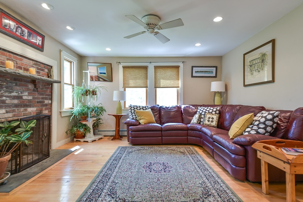 5 Lupine Road Natick, MA 01760 - Photo 11 of 29 a living room with furniture and a fireplace