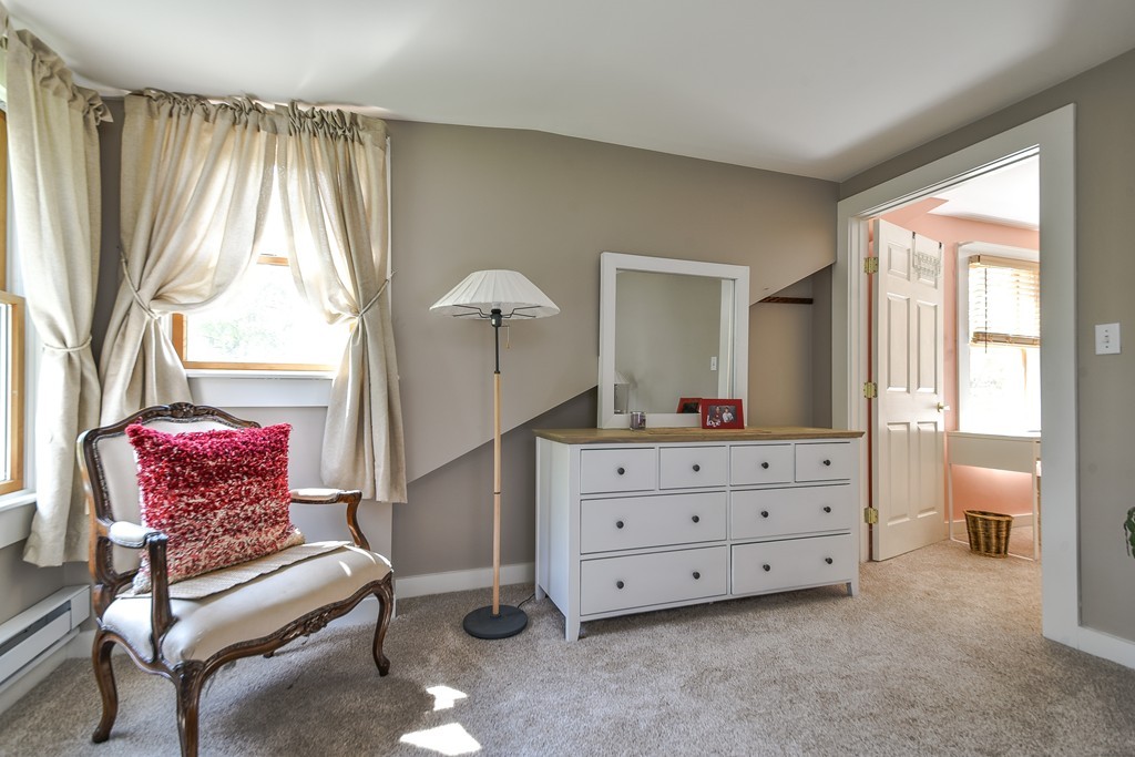 5 Lupine Road Natick, MA 01760 - Photo 20 of 29 a living room with furniture and a dresser