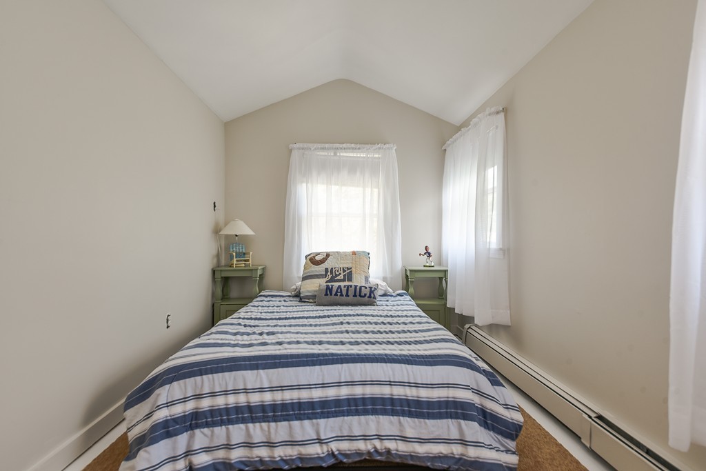 5 Lupine Road Natick, MA 01760 - Photo 23 of 29 a bedroom with a bed and window