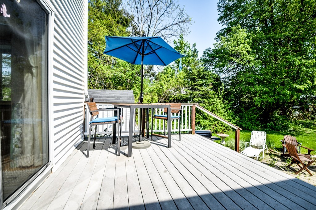 5 Lupine Road Natick, MA 01760 - Photo 27 of 29 a view of balcony with wooden floor and outdoor seating