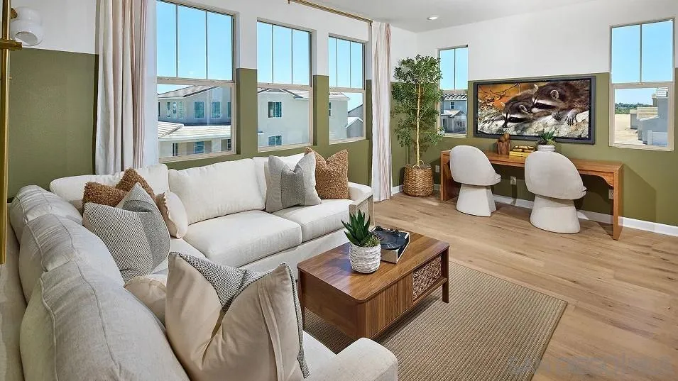 111 Metz Way Oceanside, CA 92057 - Photo 7 of 16 a living room with furniture and a large window