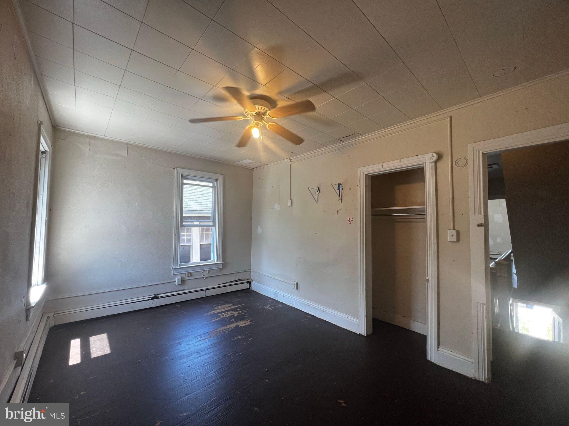 306 West Jackson Street York, PA 17401 - Photo 14 of 15 an empty room with wooden floor and a window
