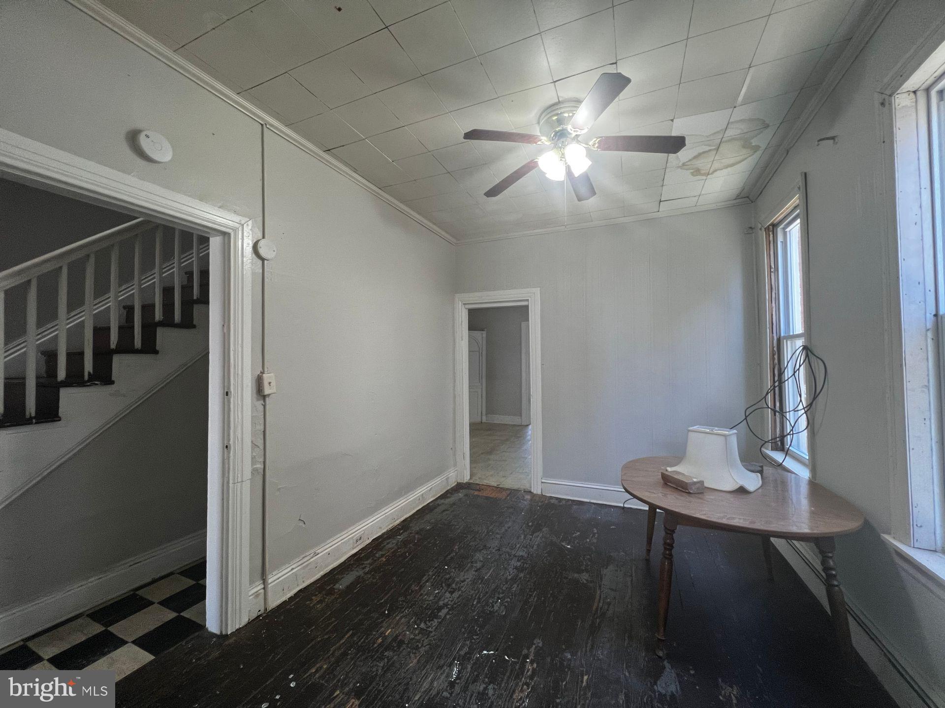 306 West Jackson Street York, PA 17401 - Photo 3 of 15 a view of a livingroom with a dinning area hardwood and a kitchen
