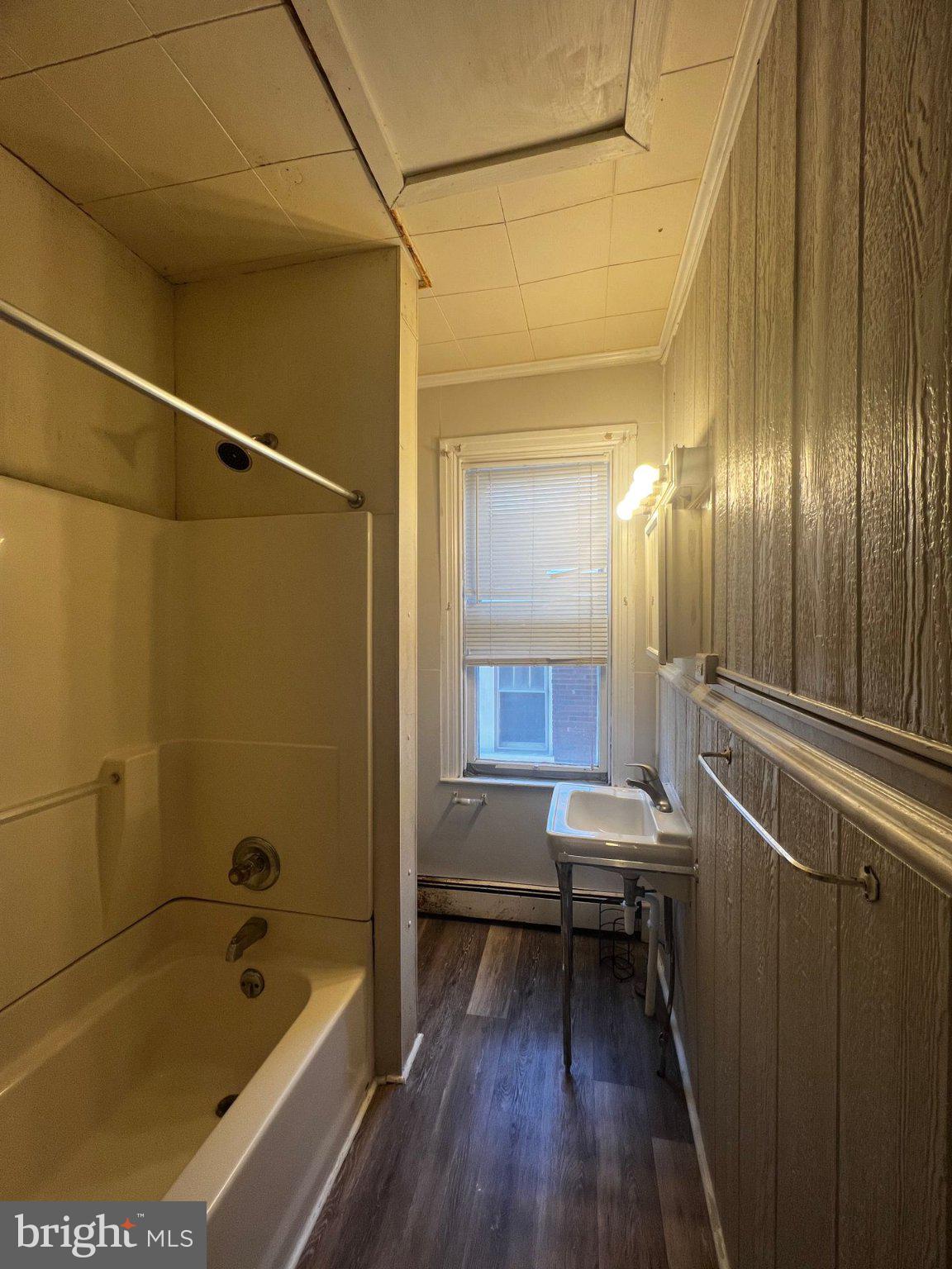 306 West Jackson Street York, PA 17401 - Photo 10 of 15 a bathroom with a tub and a sink