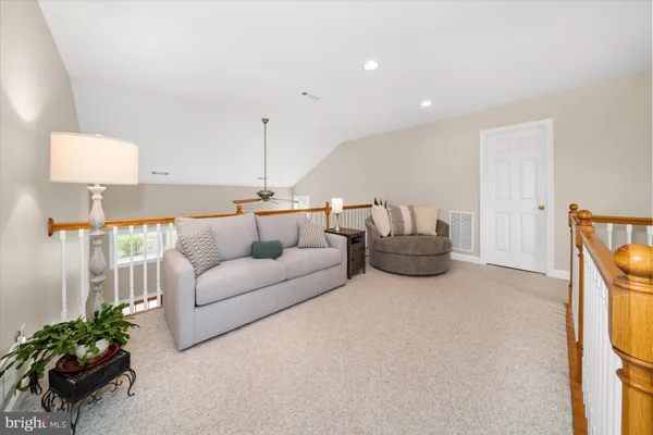 a living room with furniture and a couch