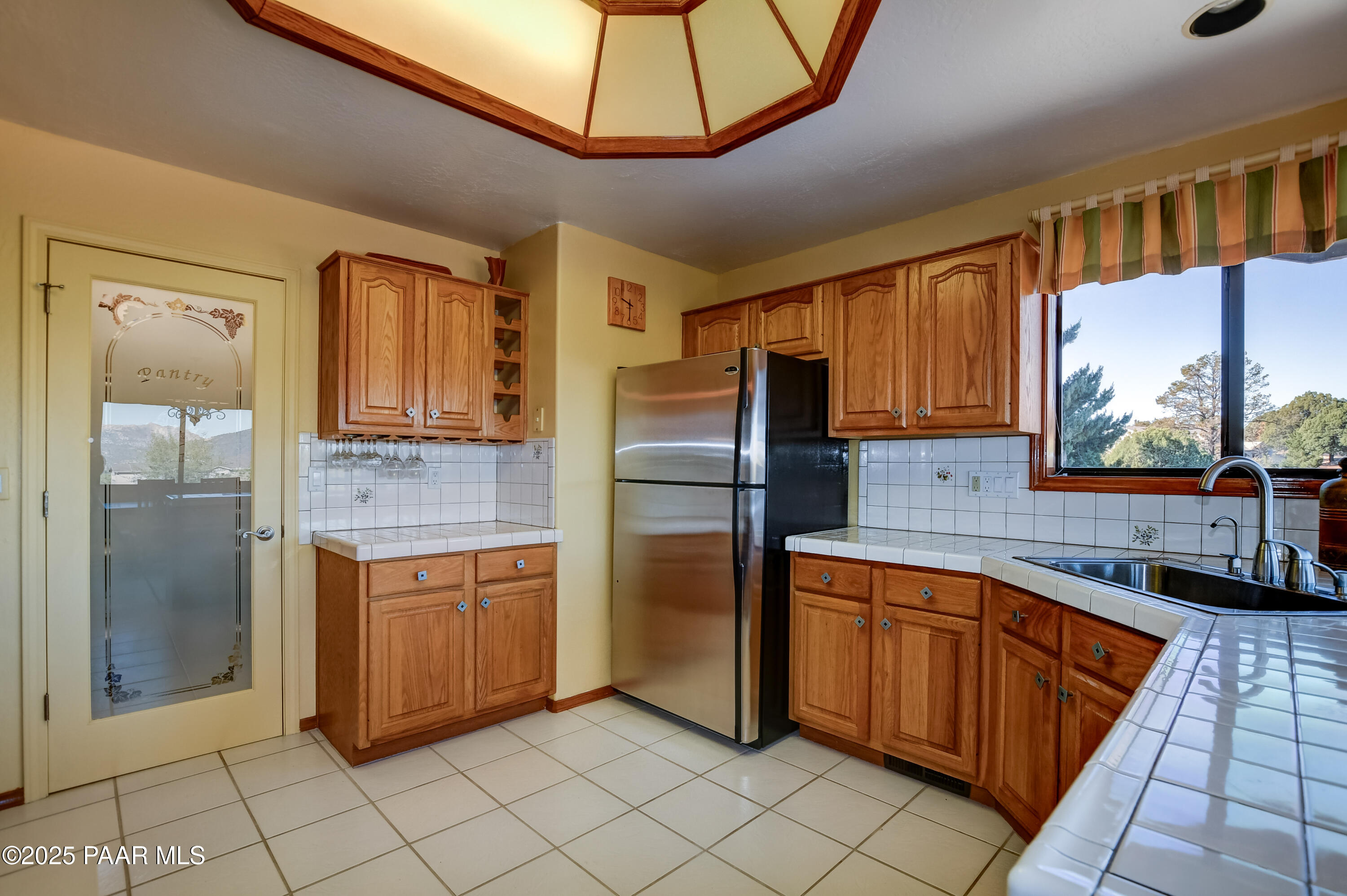 1881 Forest View Prescott, AZ 86305 - Photo 13 of 46 a kitchen with stainless steel appliances granite countertop a refrigerator and a sink