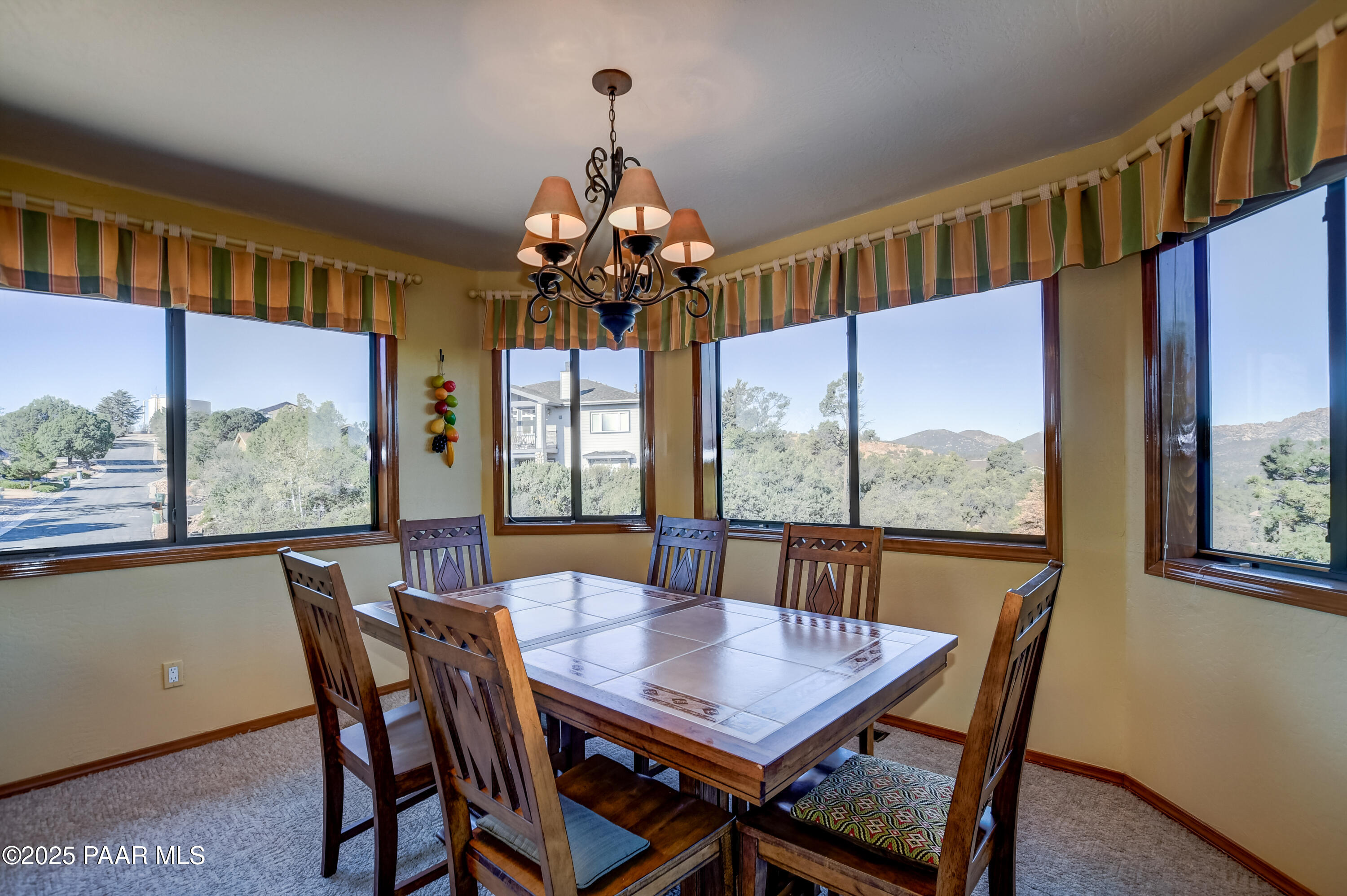 1881 Forest View Prescott, AZ 86305 - Photo 15 of 46 a view of a dining room with furniture window and outside view