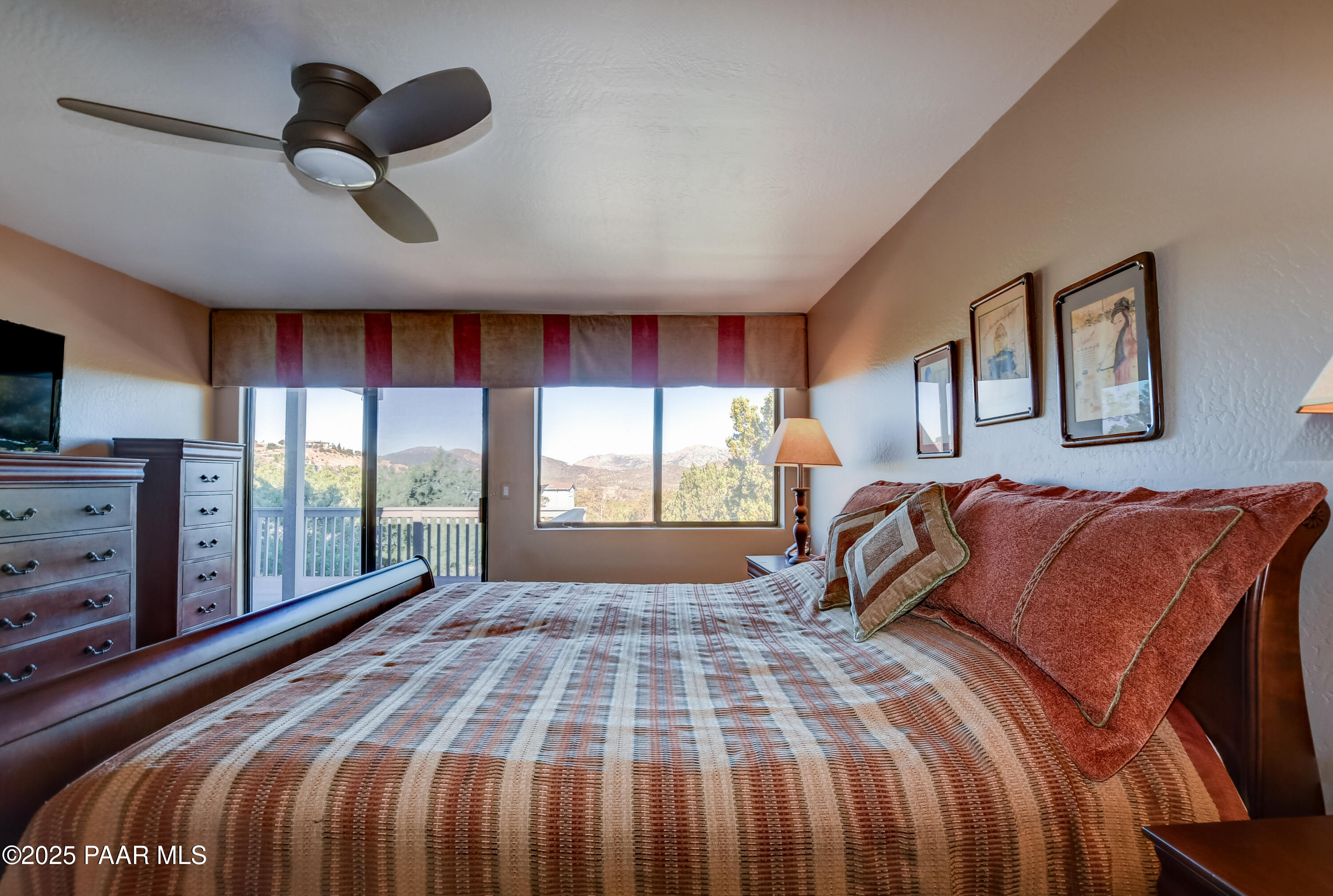 1881 Forest View Prescott, AZ 86305 - Photo 19 of 46 a bedroom with a bed and a large window