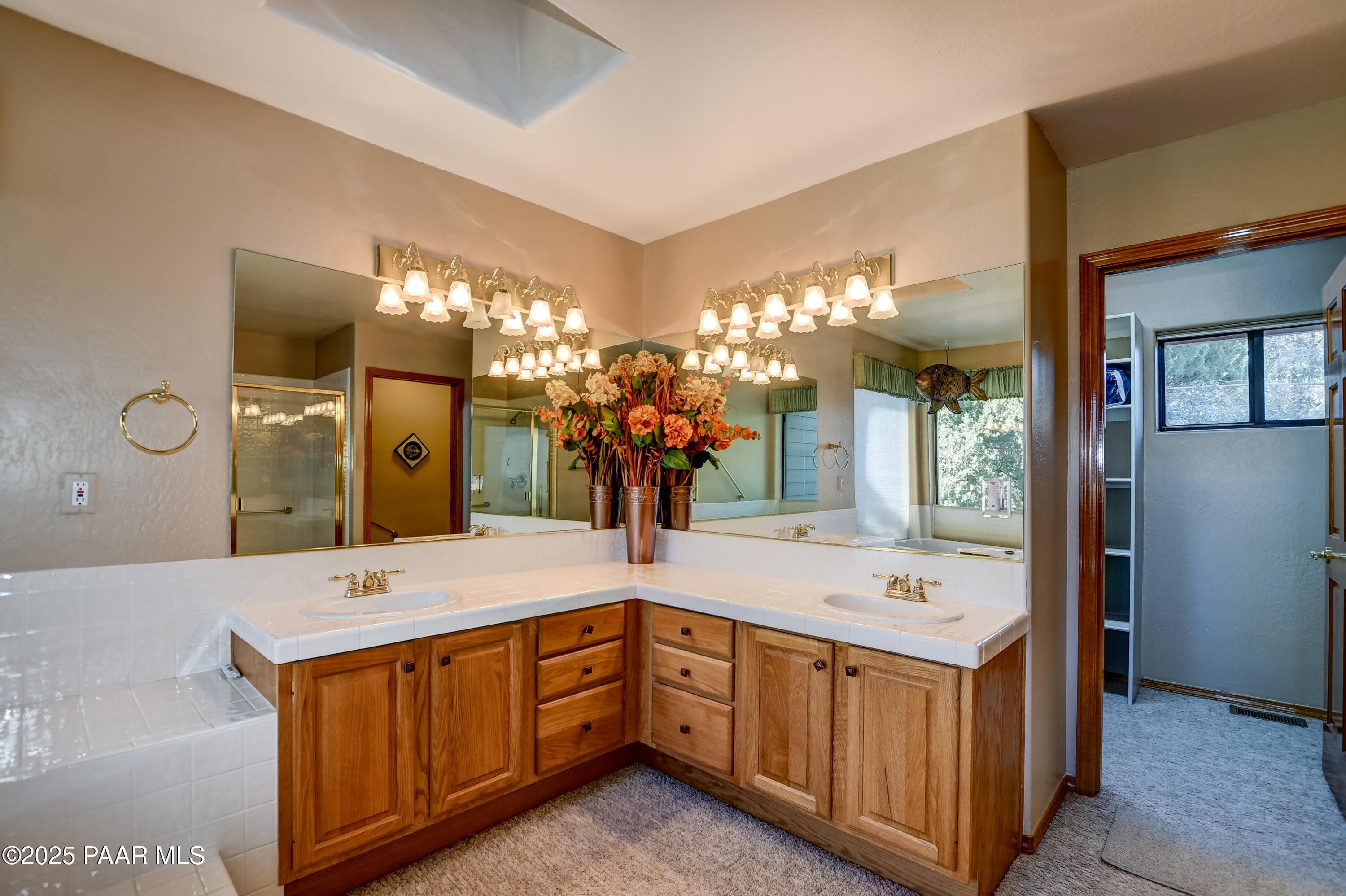 1881 Forest View Prescott, AZ 86305 - Photo 20 of 46 a spacious bathroom with a double vanity sink and a mirror