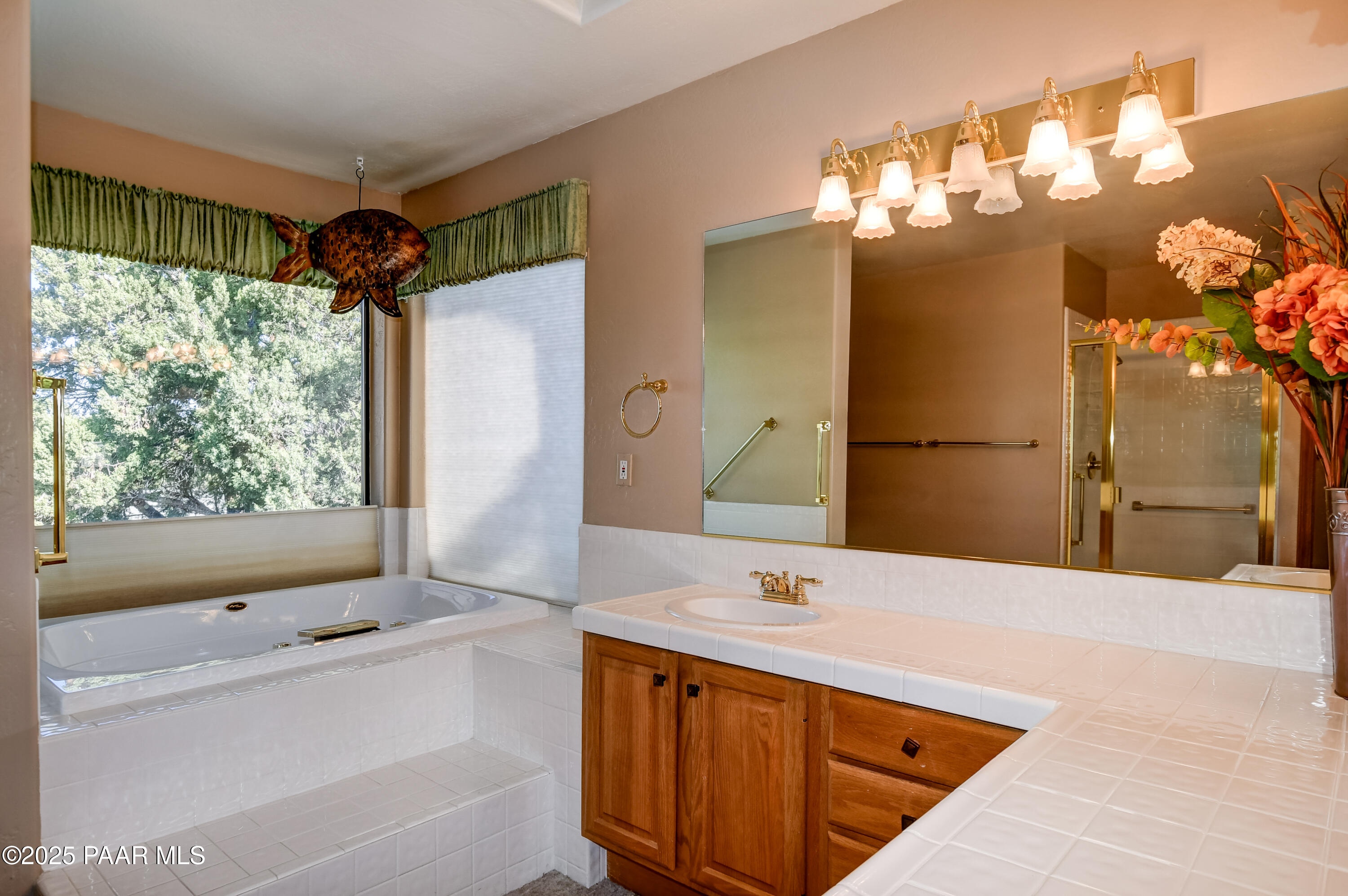 1881 Forest View Prescott, AZ 86305 - Photo 21 of 46 a bathroom with a tub sink and mirror