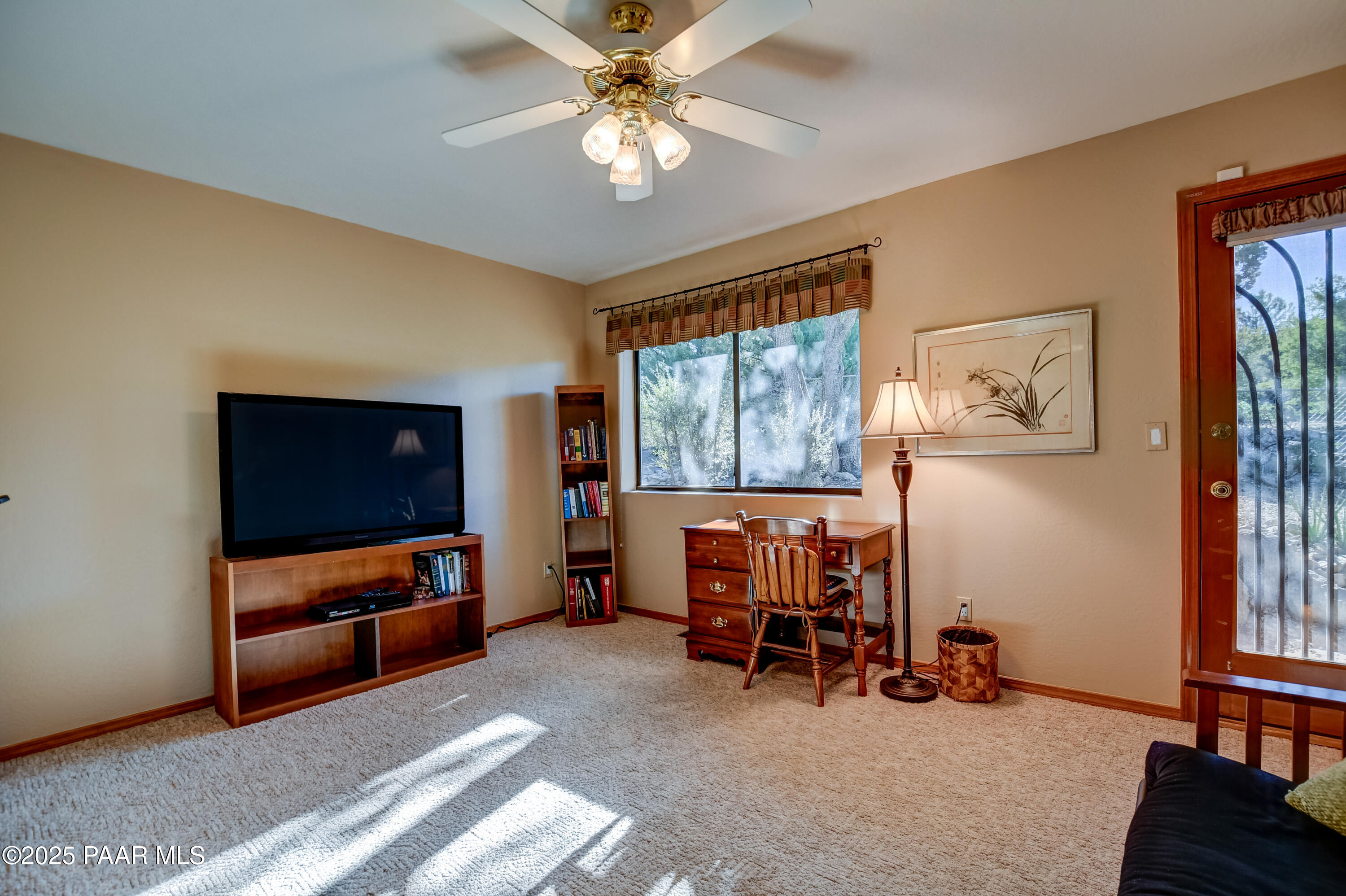 1881 Forest View Prescott, AZ 86305 - Photo 24 of 46 a living room with furniture and a flat screen tv