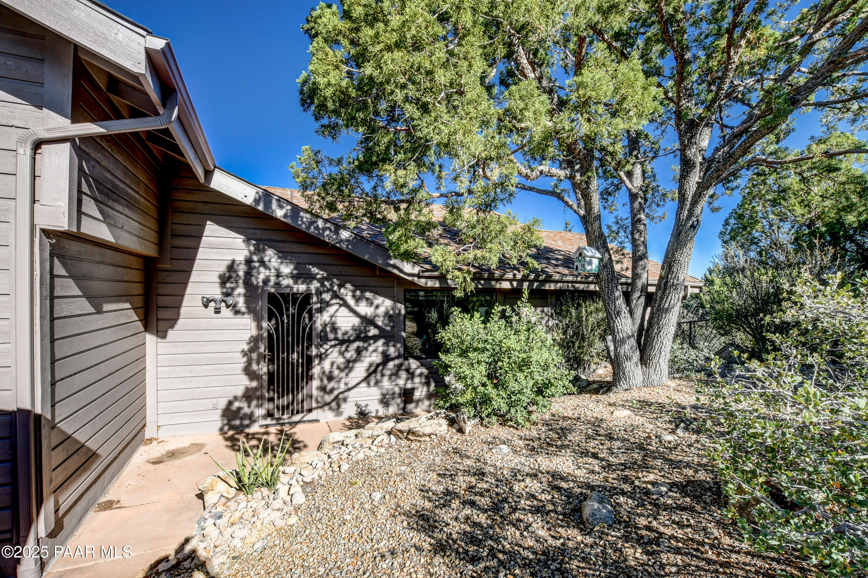 1881 Forest View Prescott, AZ 86305 - Photo 35 of 46 a backyard of a house with lots of green space