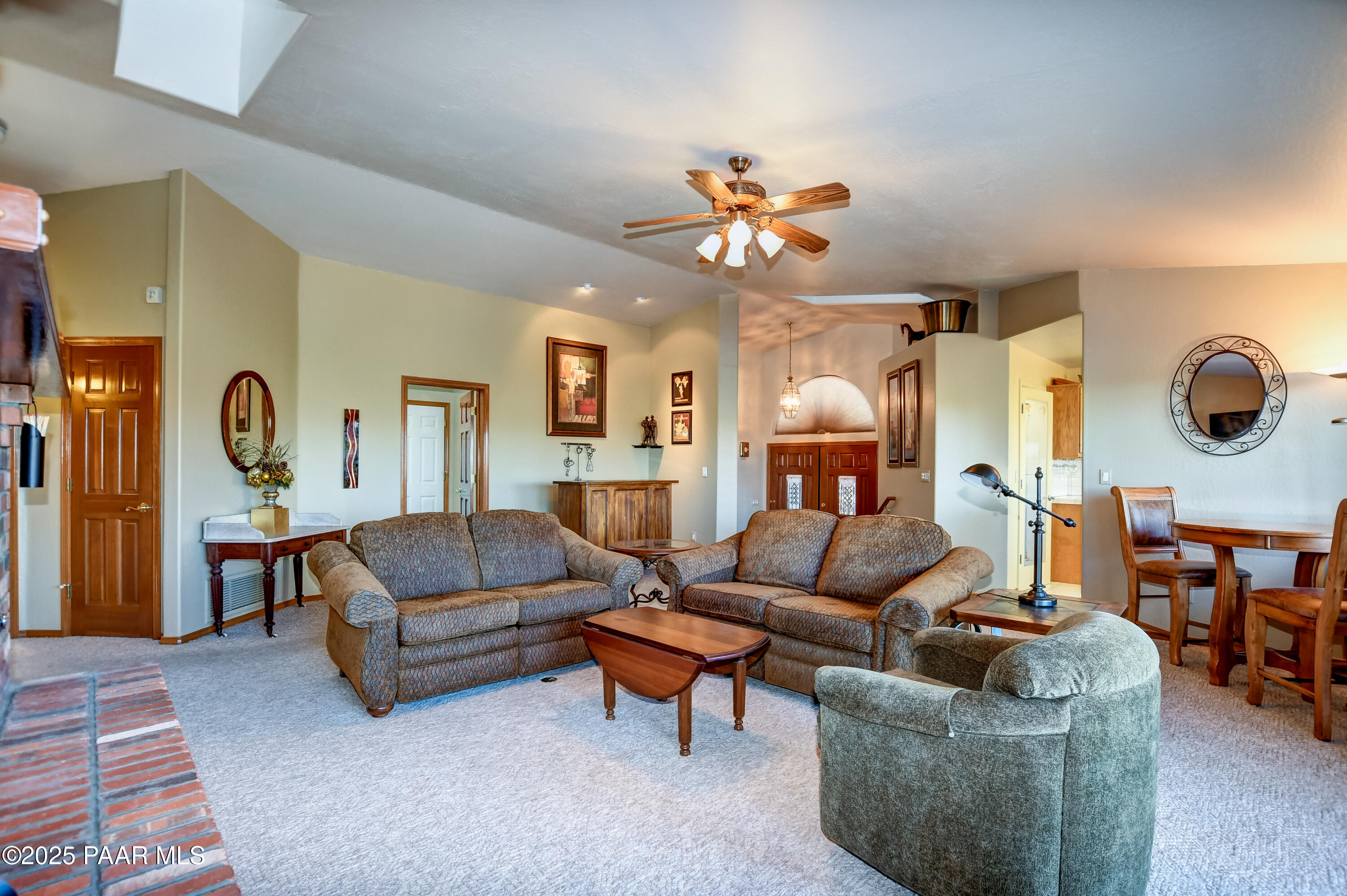 1881 Forest View Prescott, AZ 86305 - Photo 8 of 46 a living room with furniture and a large window
