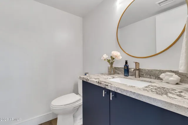 an aerial view of a house with a garden