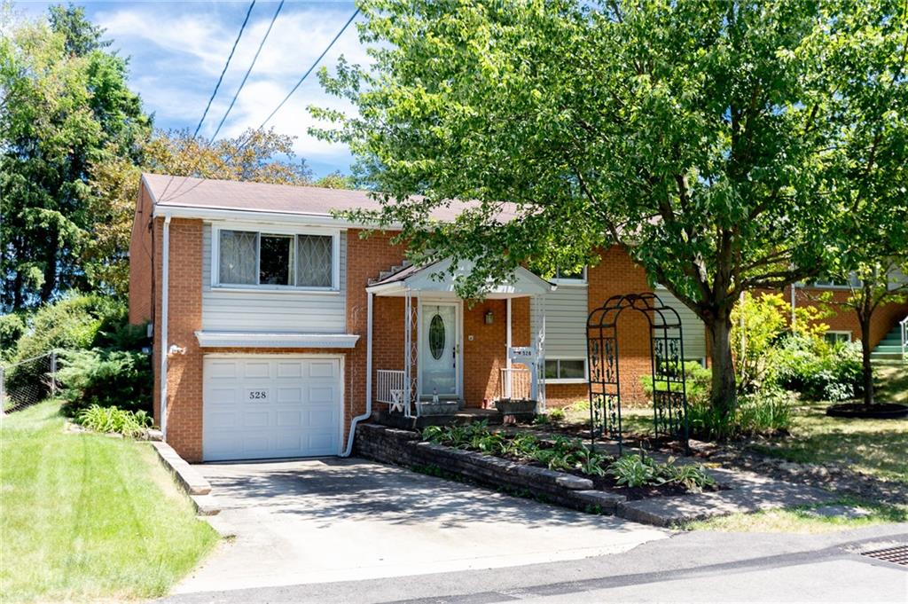 a front view of house with yard