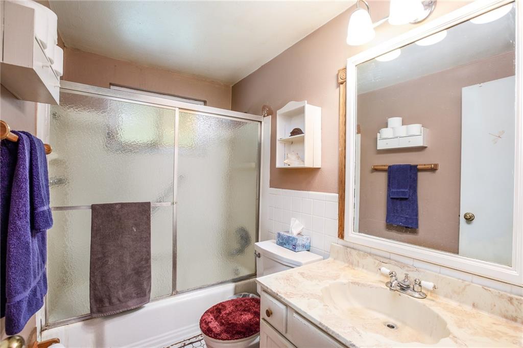 528 MacBeth Drive Pittsburgh, PA 15235 - Photo 11 of 20 a bathroom with a sink and a mirror