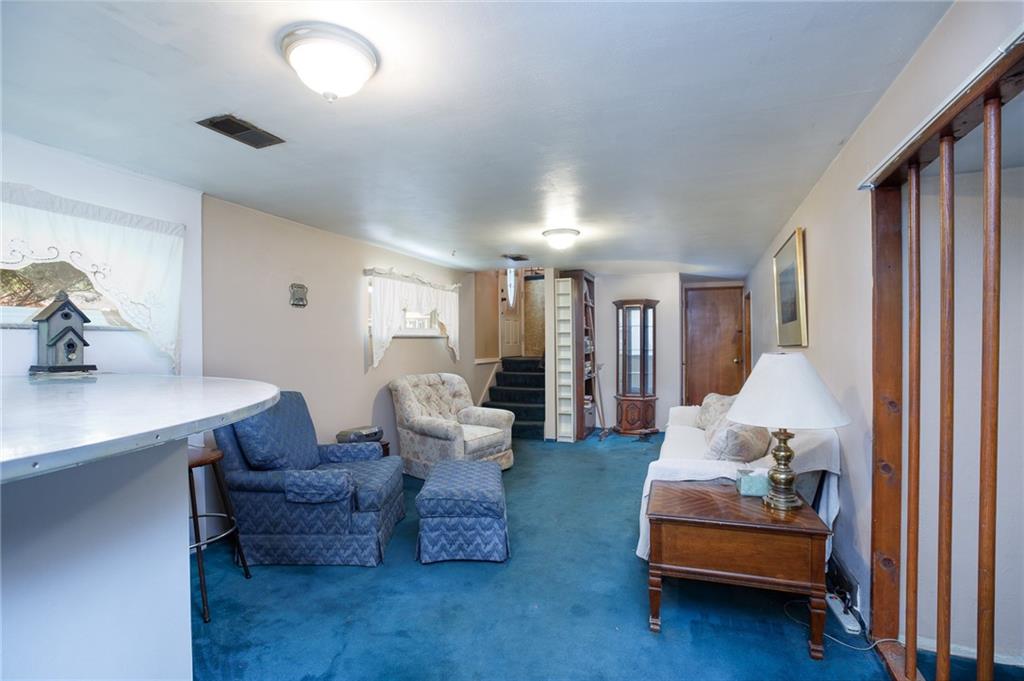528 MacBeth Drive Pittsburgh, PA 15235 - Photo 13 of 20 a living room with furniture and wooden floor
